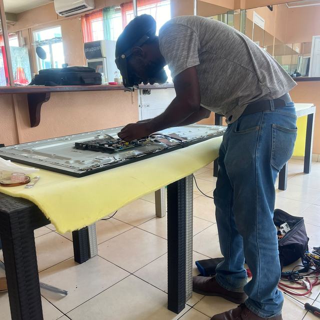 TV being repaired on the workbench